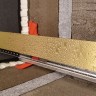 Желоб BERGES водосток WALL 1000 пристенный, золото глянец, S-сифон D50/105 H50 вертикальный